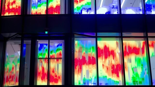 Modern building facade with colorful thermal images