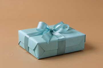 The gift box is green on a beige background.