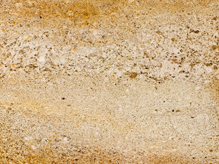 Beige stone texture with small particles, natural background, surface, building material, details, abstraction
