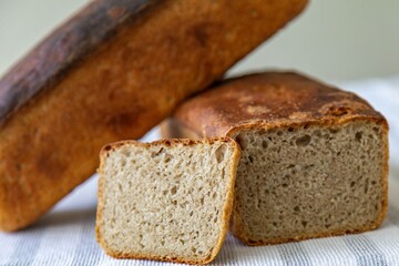 Rustic colonial rye bread. Well-lit image, clear selective focus on the details of the bread...