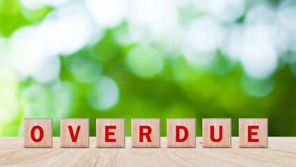 Overdue, Wooden on the office desk, informative and communication background, Word OVERDUE made...