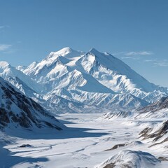 Naklejka premium Snowy Mountains and Valley Landscape Under Blue Sky