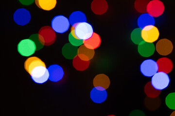 Colorful bokeh lights on dark background
