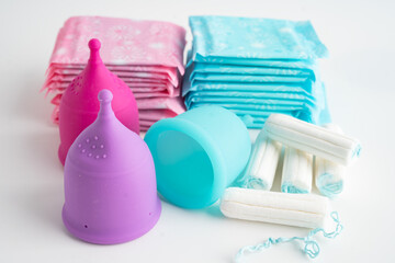 Menstruation cycle with sanitary pad and cotton tampon for woman hygiene and protection.