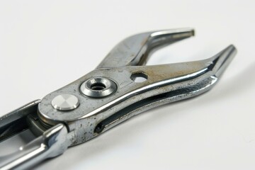 Locking pliers with metal teeth on white background showing signs of use