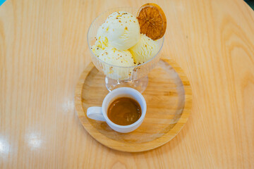 Affogato, ice cream, espresso on wooden table at coffee shop