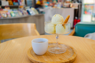 Affogato, ice cream, espresso on wooden table at coffee shop