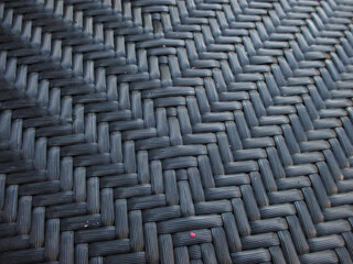 Black woven chair texture details. minimalist home interior.