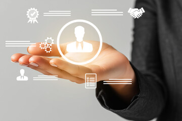 Businesswoman holding glowing profile icon with settings and business interface symbols. Human resources and employee management system concept. generative ai