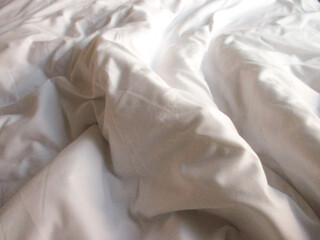 White blanket crumpled textile background messy. Fabric cotton background