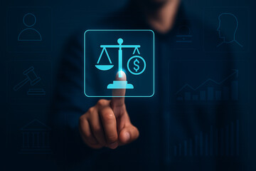 Businessman Touches Holographic Justice Scale Icon With Money Symbol in Futuristic Interface for Legal Technology and Financial Decision Concepts