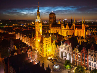 Fototapeta premium Noctilucent Clouds over the Gdansk Main Town at summer night, Poland.