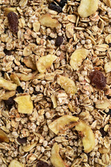crispy muesli with dried bananas and raisins close up  