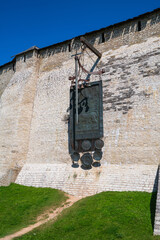 A view of the Pskov Kremlin fortress wall by Percy and Installation with a sword in honor of the victory over the Livonians in the Battle of the Icei, Pskov, Russia.