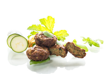 Homemade zucchini muffins on a white isolated background