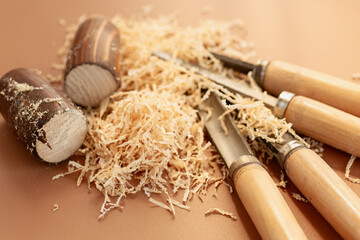 Wood carving close-up with sawdust