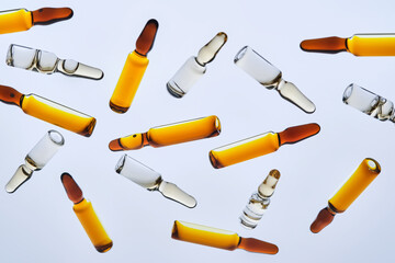 Beautiful background with different ampoules.
