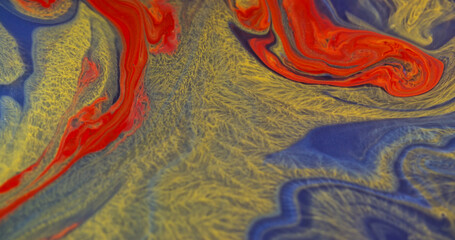 Twirl ink. Flowing wave. Defocused blue orange yellow color swirling liquid spreading on abstract...