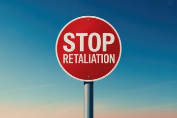 Red Round Stop Retaliation Sign with White Text on Pole Under Blue Sky