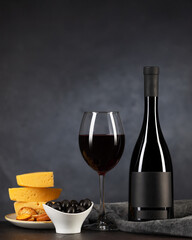 Red wine, cheese and black olives