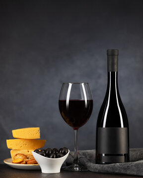 Red wine, cheese and black olives