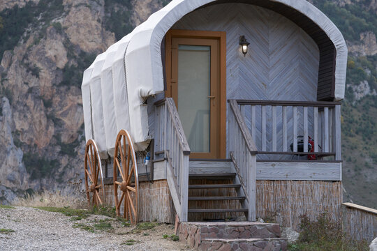 Conceptual design of a summer cafe in the form of a gypsy van against the backdrop of a steep cliff. Territory of the Chegem Aeroclub.