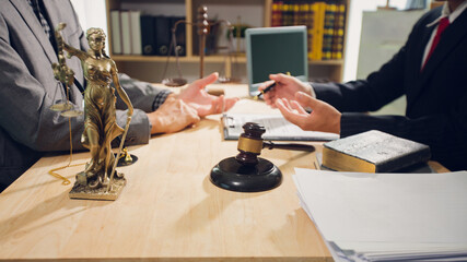 Businessmen consult with lawyers, submit additional documents, and pay for lawyers' services. After...