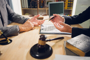 Businessmen consult with lawyers, submit additional documents, and pay for lawyers' services. After...