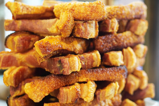 traditional spanish cuisine. torreznos de soria placed in a tower in a typical tapas bar.
