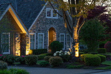 Entrance of luxury house with nice spring blossom landscape at night in Vancouver, Canada, North...