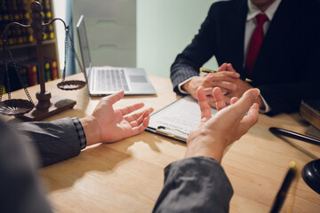 Businessmen consult with lawyers, submit additional documents, and pay for lawyers' services. After...