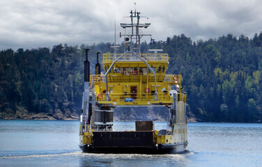 Front open door of passenger freight cargo ferry boat vessel ship with loaded cars and vehicles....