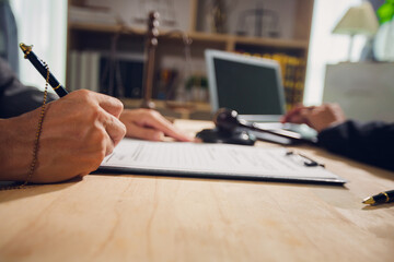 Businessmen consult with lawyers, submit additional documents, and pay for lawyers' services. After...
