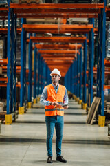 Warehouse manager using digital tablet and controlling goods distribution process