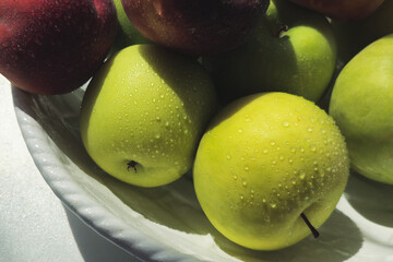 green apples in a bowl. organic food. healthy food diet