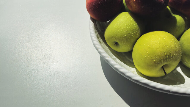 green apples in a bowl image with a place for text. organic food. healthy food diet