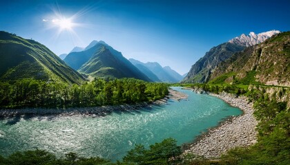 majestic river winding through rocky mountains and lush greenery in a serene landscape during daytime