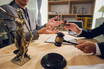 Businessmen consult with lawyers, submit additional documents, and pay for lawyers' services. After...