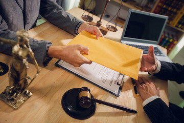 Businessmen consult with lawyers, submit additional documents, and pay for lawyers' services. After...