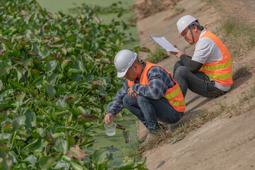 Environmental engineers inspect water quality,Bring water to the lab for testing,Check the mineral...