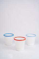 Grey plastic tray isolated on white background, white Plastic Laundry Baskets On White Background, Close-up of blue basket against white background
