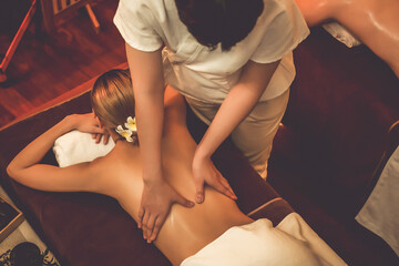 Caucasian woman customer enjoying relaxing anti-stress spa massage and pampering with beauty skin...