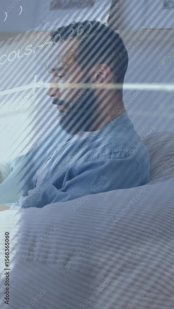 Poster animation of graphs, lines and computer language over caucasian man using smartphone