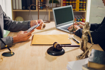 Businessmen consult with lawyers, submit additional documents, and pay for lawyers' services. After...