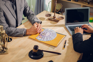 Businessmen consult with lawyers, submit additional documents, and pay for lawyers' services. After...