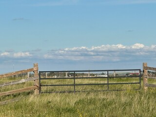 Rustic Farm Fence in Rural Countryside Landscape
