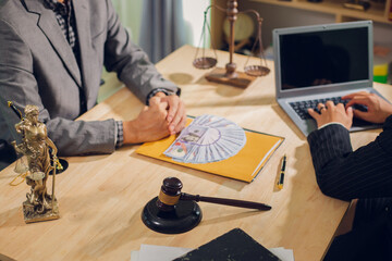 Businessmen consult with lawyers, submit additional documents, and pay for lawyers' services. After...