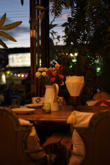 restaurant at night flowers aestetic date night cosy