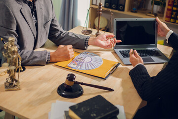Businessmen consult with lawyers, submit additional documents, and pay for lawyers' services. After...