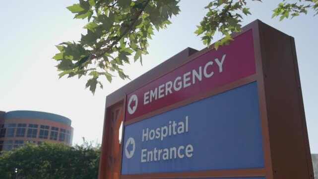 Emergency Sign at Hospital in USA. Emergency Room and Medical Care Building. Hospital, Medical Center, Emergency Room.